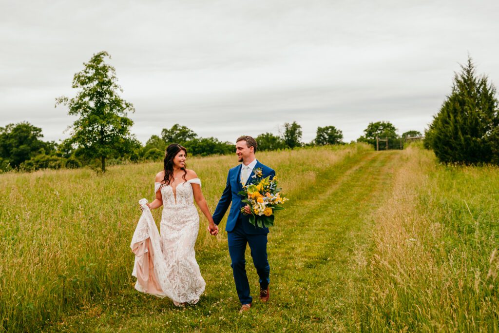golden-hour-field-elopement-virginia.jpg Couple kissing at sunset in an open grassy field during their golden hour Virginia elopement